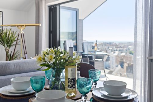 A table laid with thoughtful touches in a South Devon holiday home