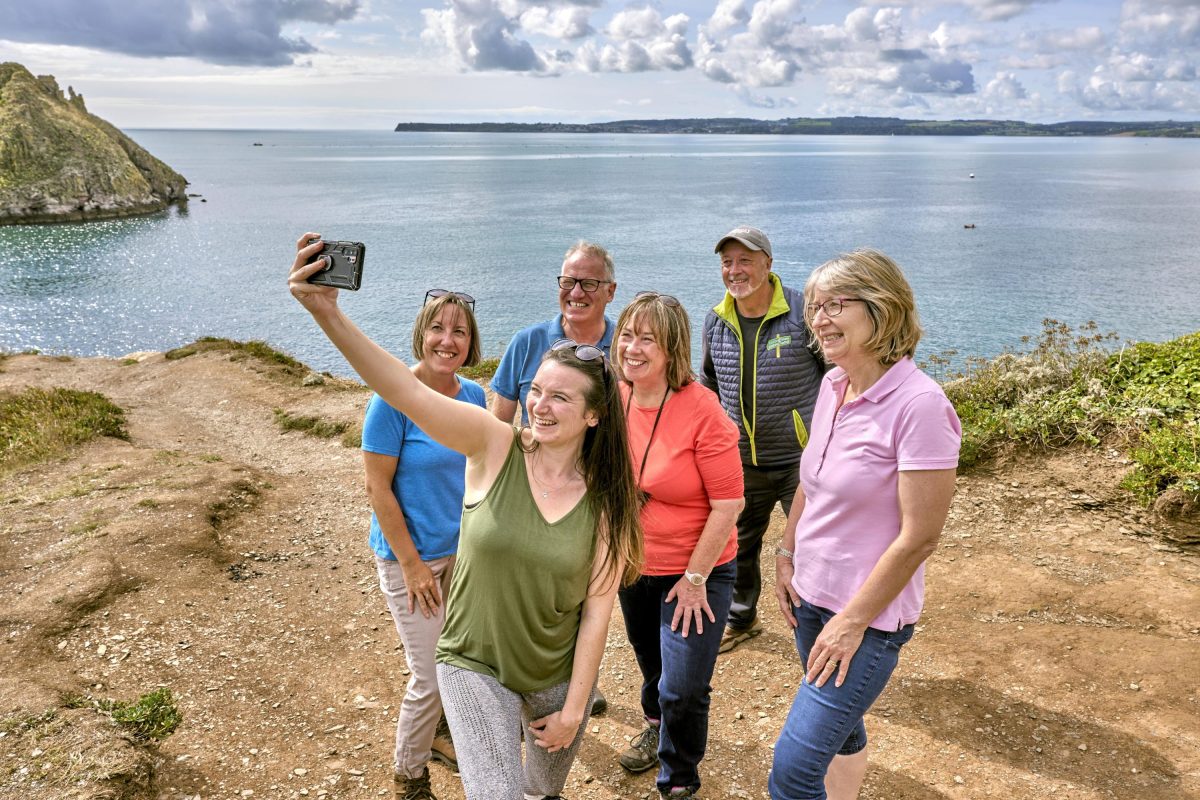 Muti-generational group on a walk along the South West Coast Path 