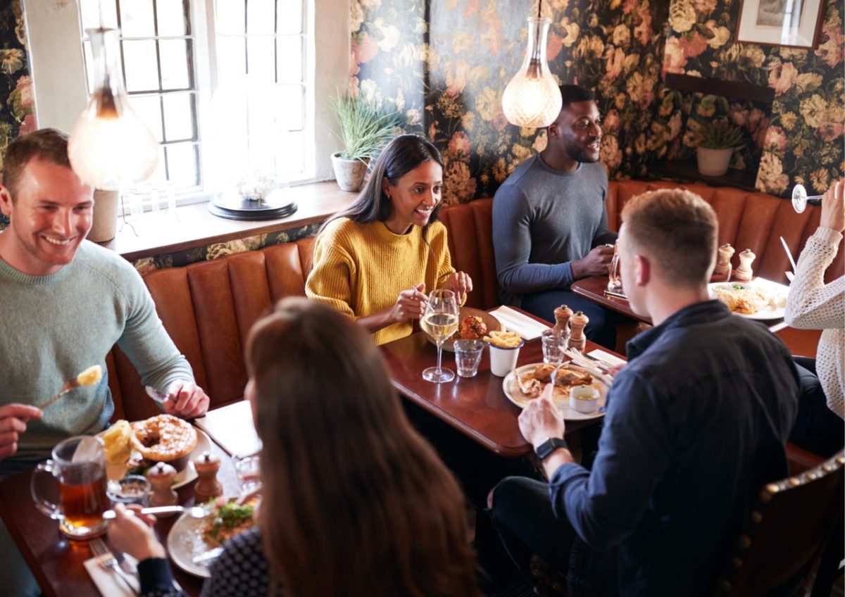 Freinds enjoying a meal out together in South Devon