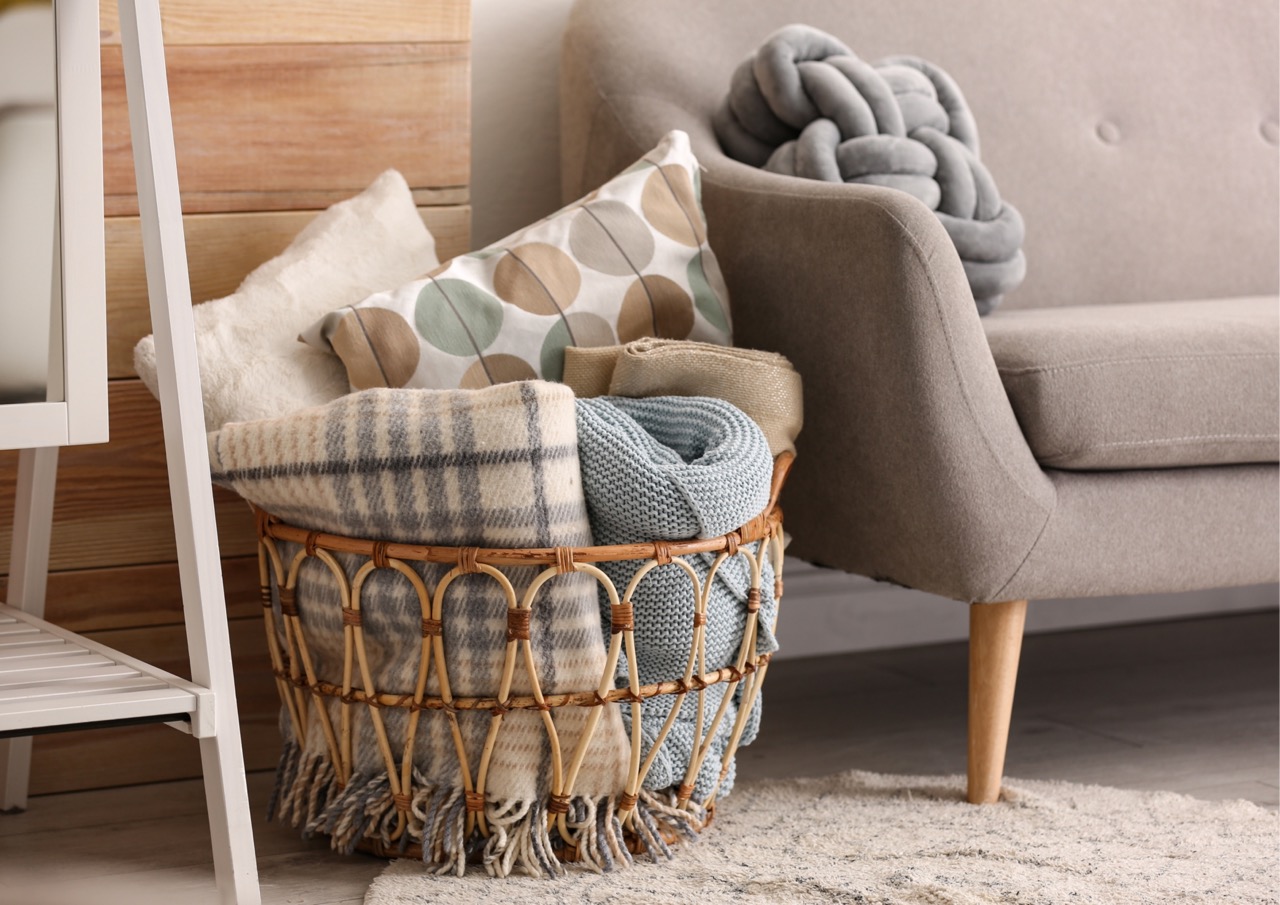 A basket of extra blankets to cosy up on the sofa with during colder months