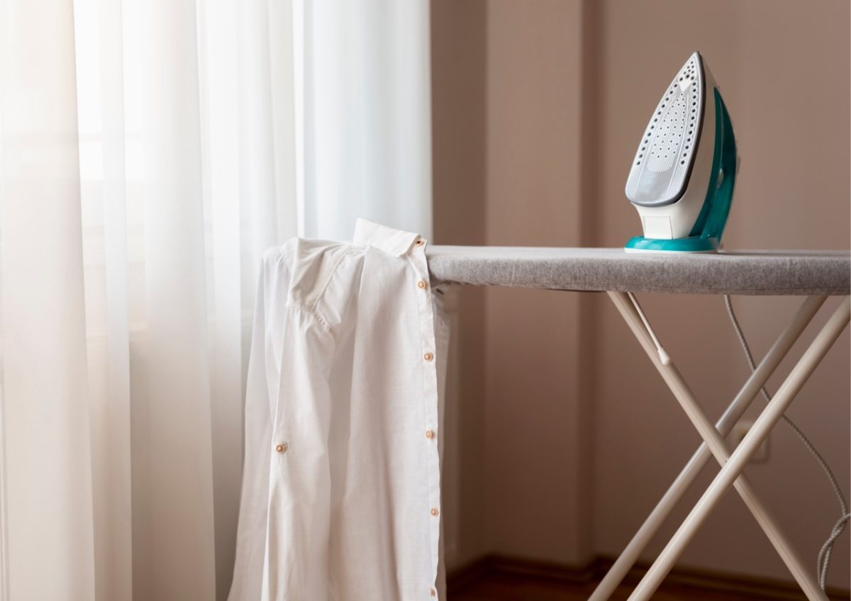 An iron and ironing board ready for guests to use in a holiday home in South Devon