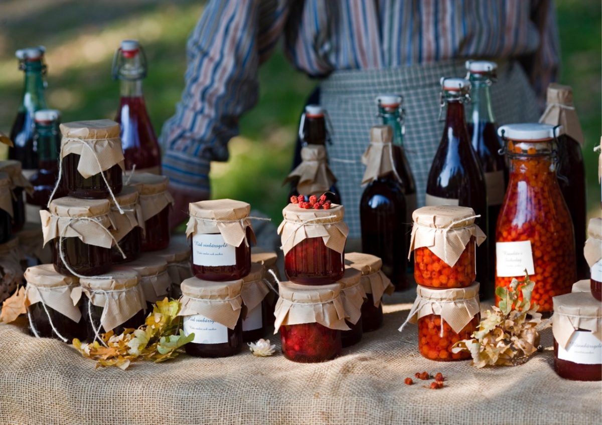 Jams. preserves, chutneys and vinegars being sold at a famers market